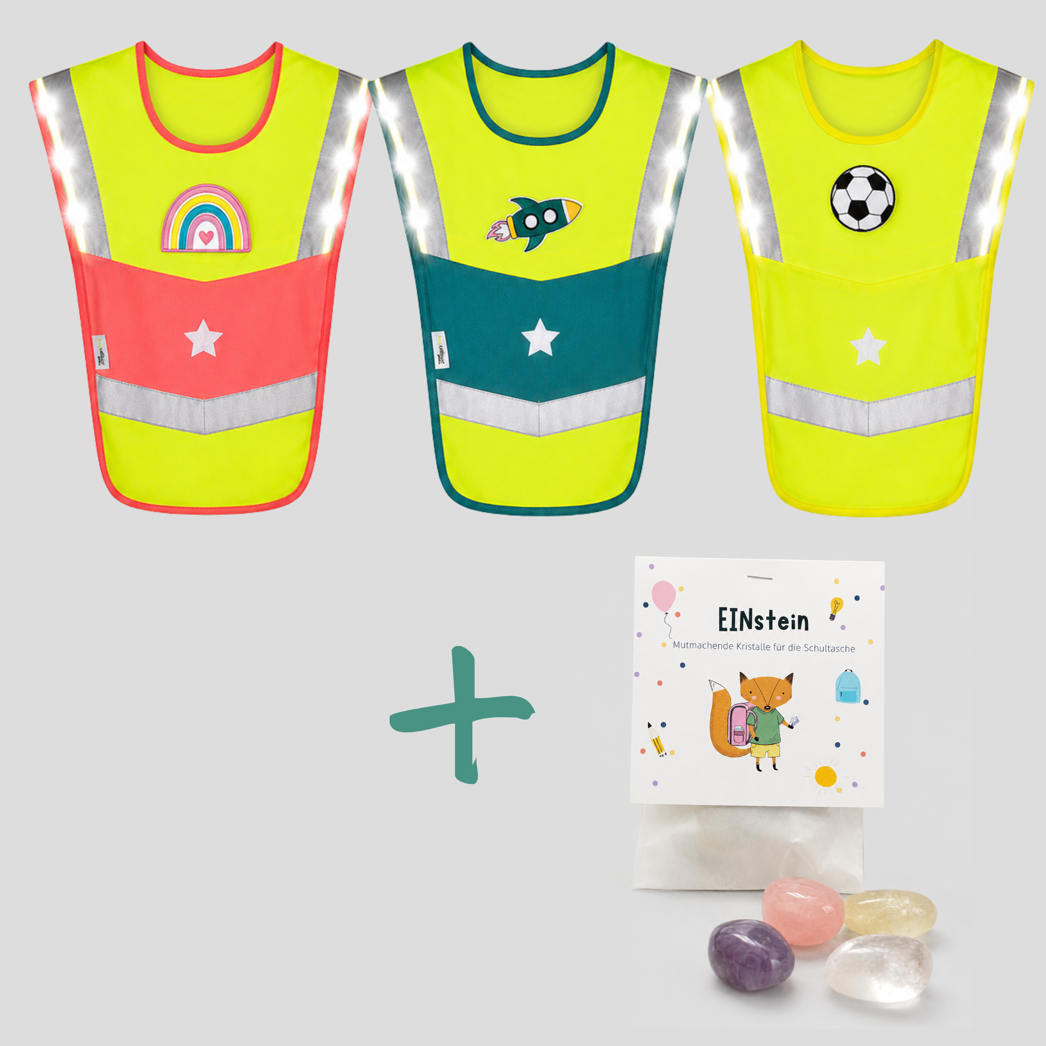 Drei LED-Warncapes in Pink, Petrol und Gelb mit Patches, kombiniert mit dem EINstein Kristalle Set